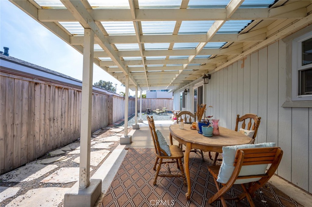 1503 17th Street Los Osos, CA 93402 - Photo 31 of 35 a view of a patio with a table and chairs