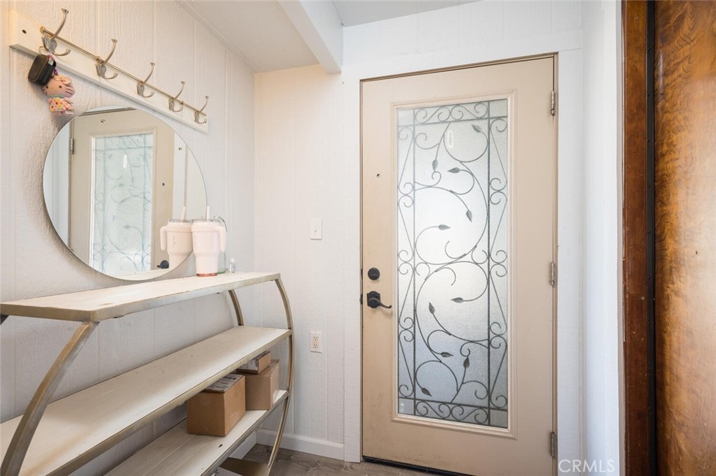 1503 17th Street Los Osos, CA 93402 - Photo 7 of 35 a bathroom with a mirror and a shower