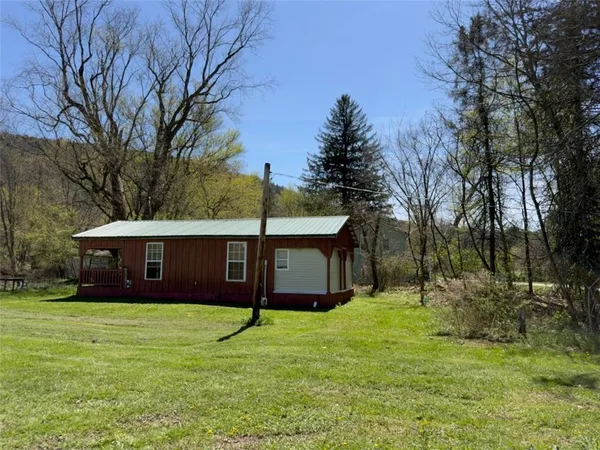 a view of backyard with green space