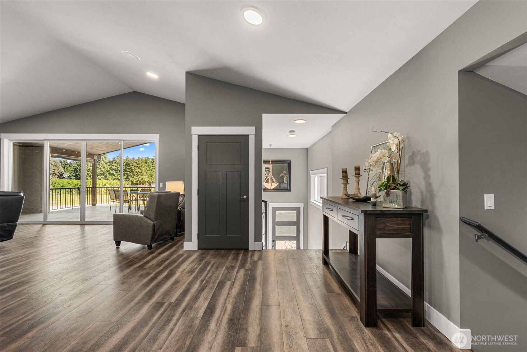 64 Spurlock Lane Monitor, WA 98836 - Photo 3 of 40 a living room with stainless steel appliances furniture wooden floor and a rug
