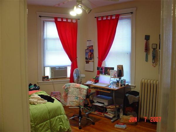 65 Lanark Road, Unit 3 Boston, MA 02135 - Photo 3 of 6 a bedroom with furniture and a bed