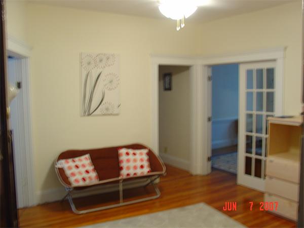 65 Lanark Road, Unit 3 Boston, MA 02135 - Photo 6 of 6 a living room with furniture