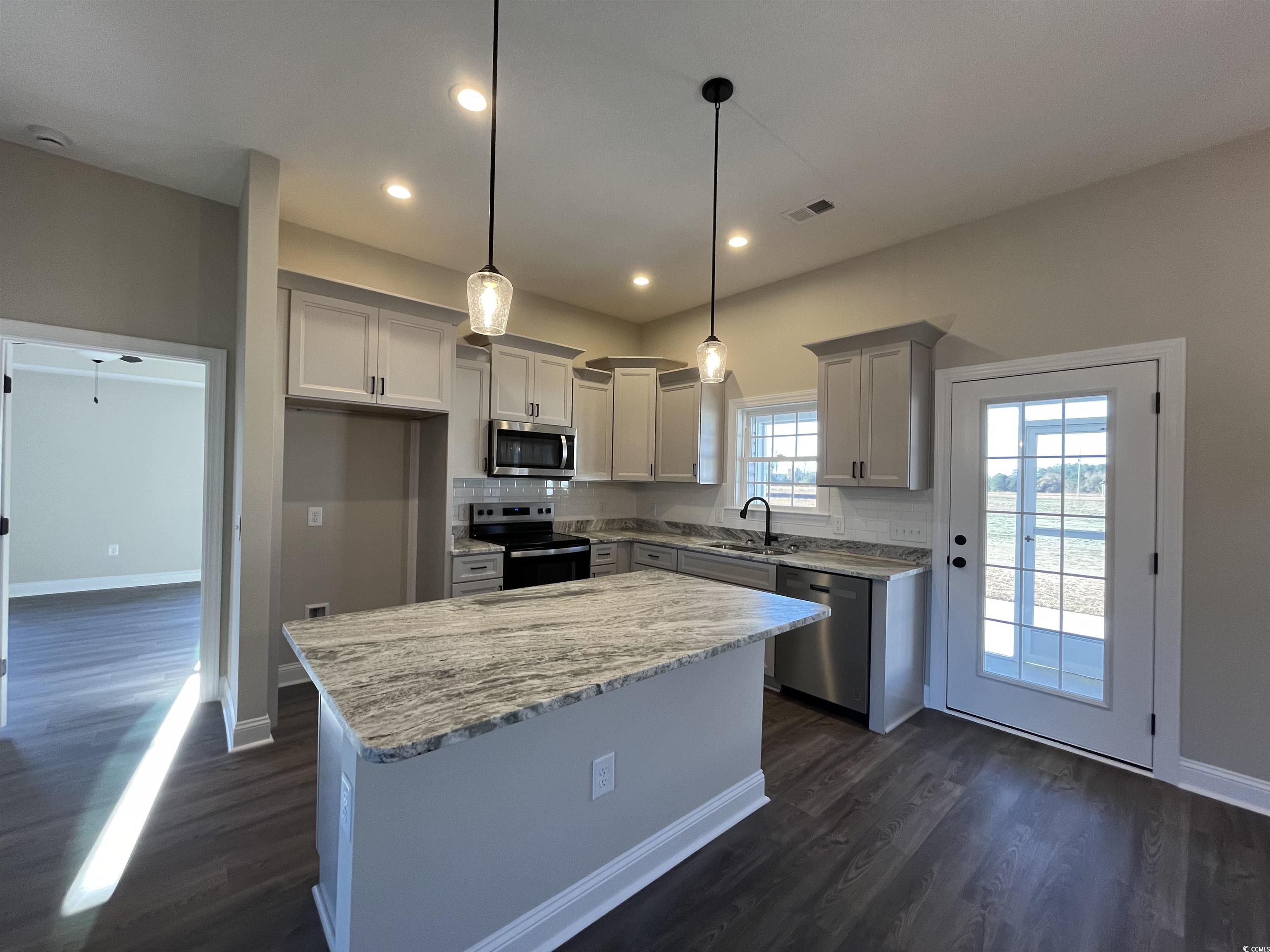 8201 Kerl Road Aynor, SC 29511 - Photo 6 of 20 Kitchen with stainless steel appliances, light sto