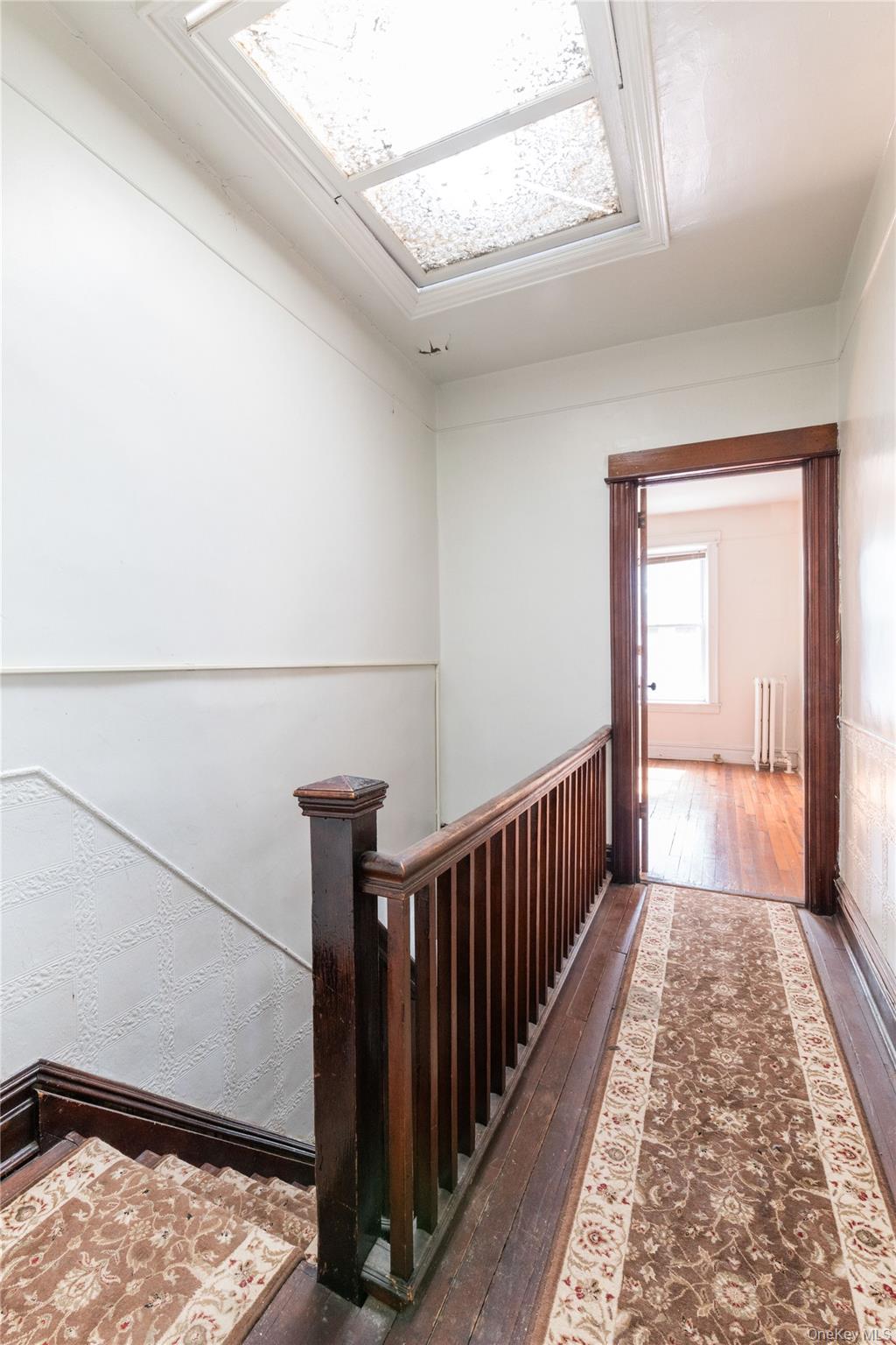 82-72 88th Place Queens, NY 11421 - Photo 12 of 26 a view of a hallway