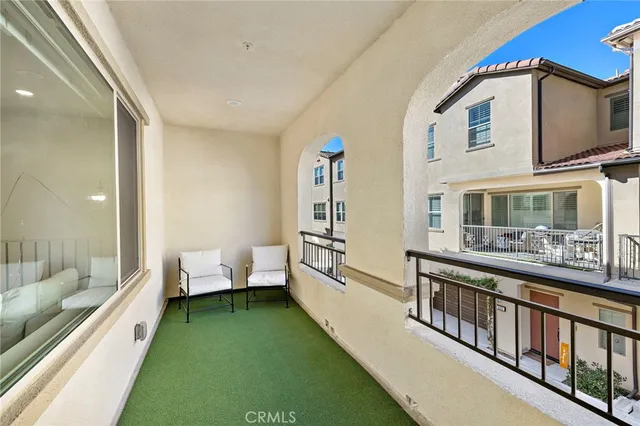 a bathroom with a sink mirror vanity and toilet