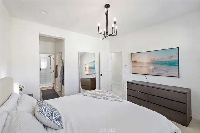 a bathroom with double vanity sink and mirror