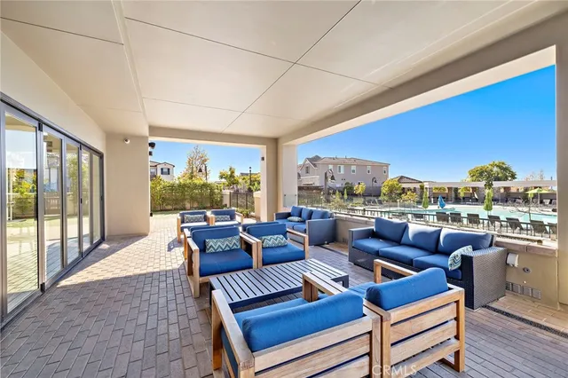 a view of a house with a yard and a slide