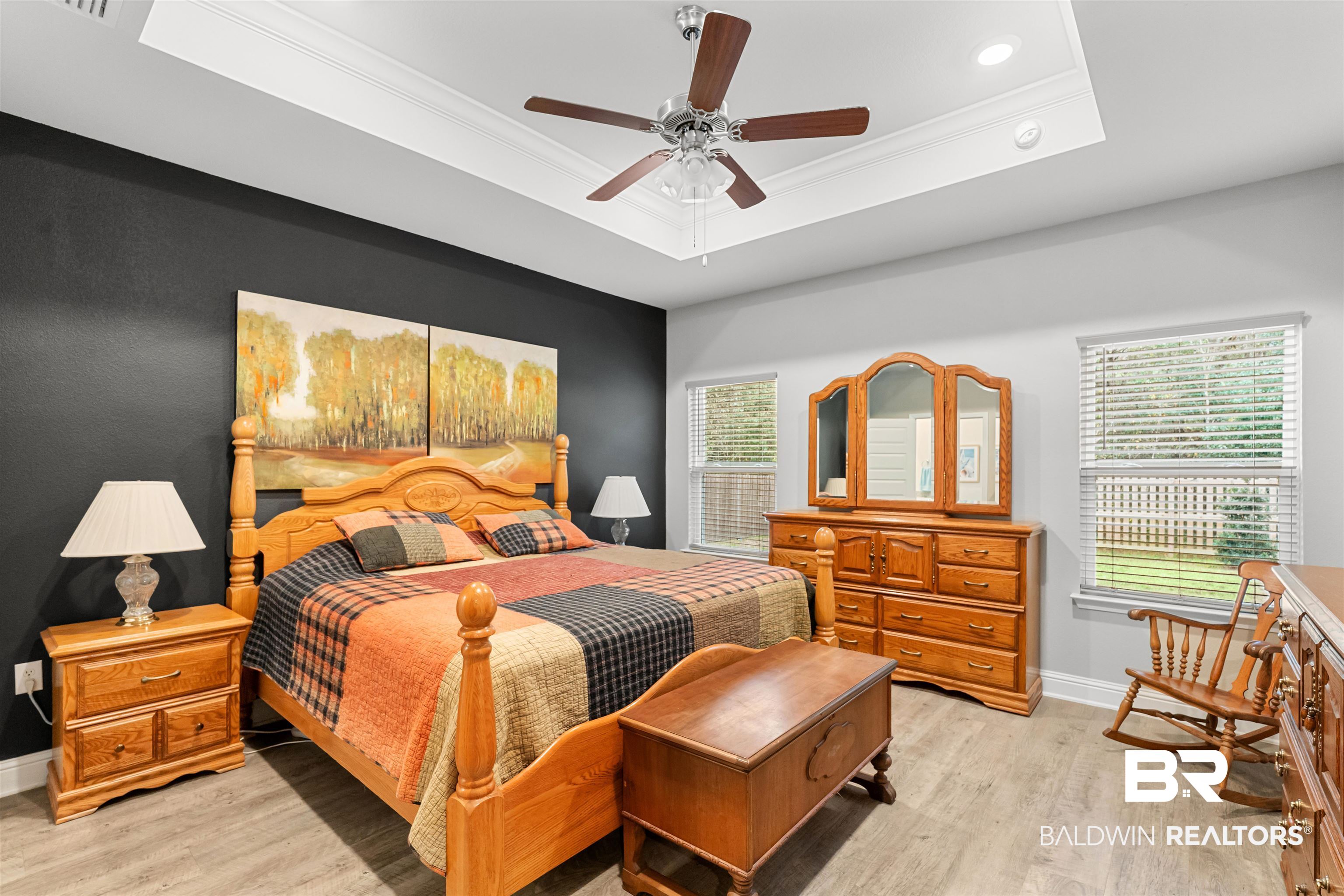 697 Calibre Street Fairhope, AL 36532 - Photo 9 of 18 Bedroom featuring ornamental molding, light wood-style floors, and a ceiling fan