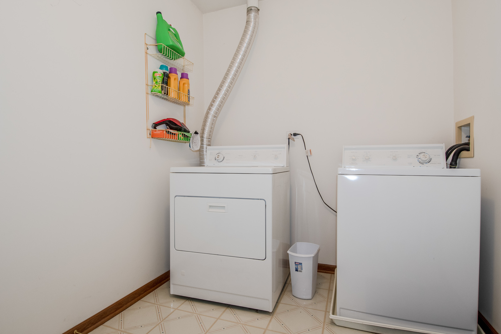 329 Sheffield Court, Unit 2 Roselle, IL 60172 - Photo 26 of 28 a utility room with dryer and washer