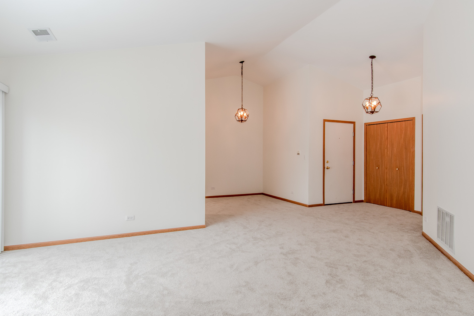 329 Sheffield Court, Unit 2 Roselle, IL 60172 - Photo 4 of 28 a view of a room with an empty space