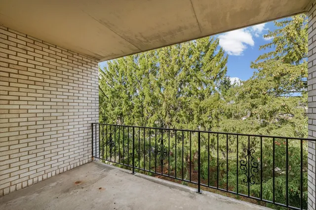 a view of a balcony with an outdoor space