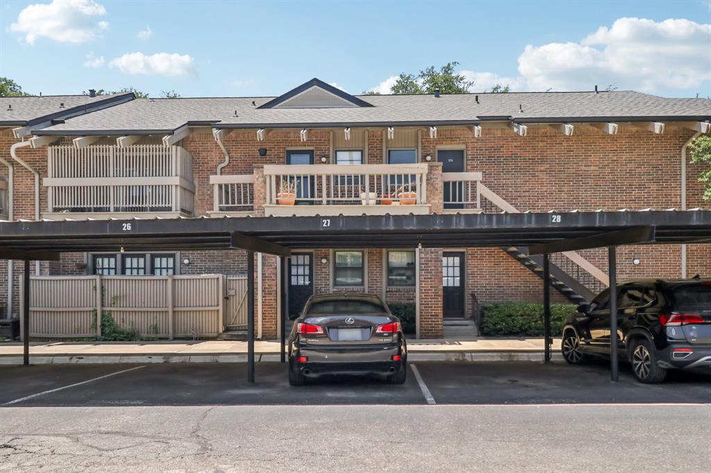 10754 Villager Road, Unit D Dallas, TX 75230 - Photo 11 of 37 a car parked in front of a building
