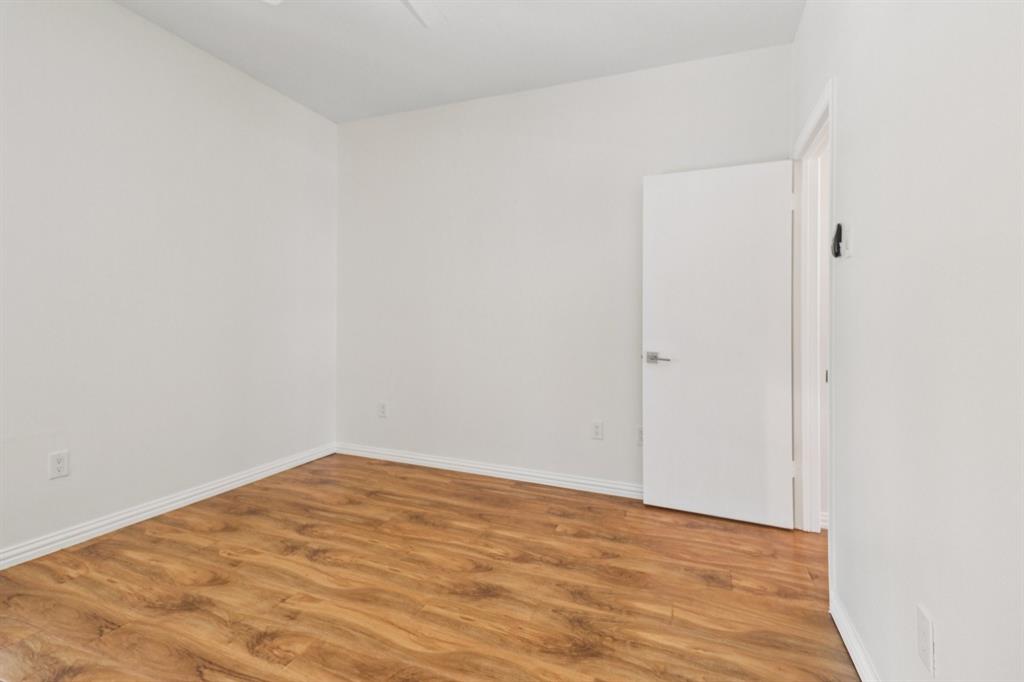 10754 Villager Road, Unit D Dallas, TX 75230 - Photo 15 of 37 a view of empty room