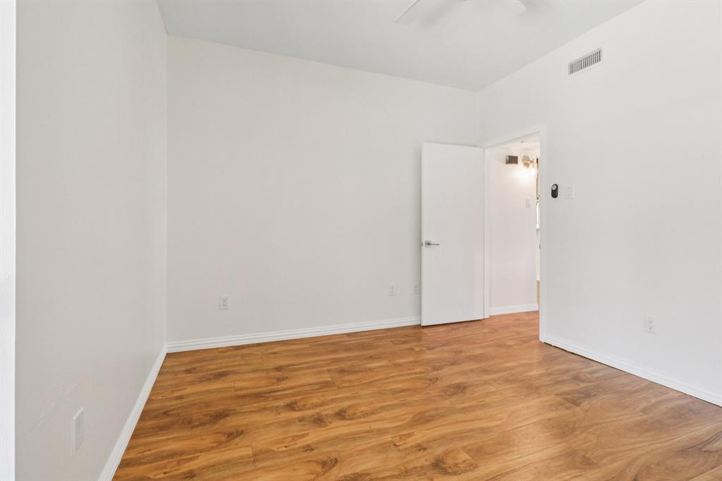 10754 Villager Road, Unit D Dallas, TX 75230 - Photo 17 of 37 a view of an empty room