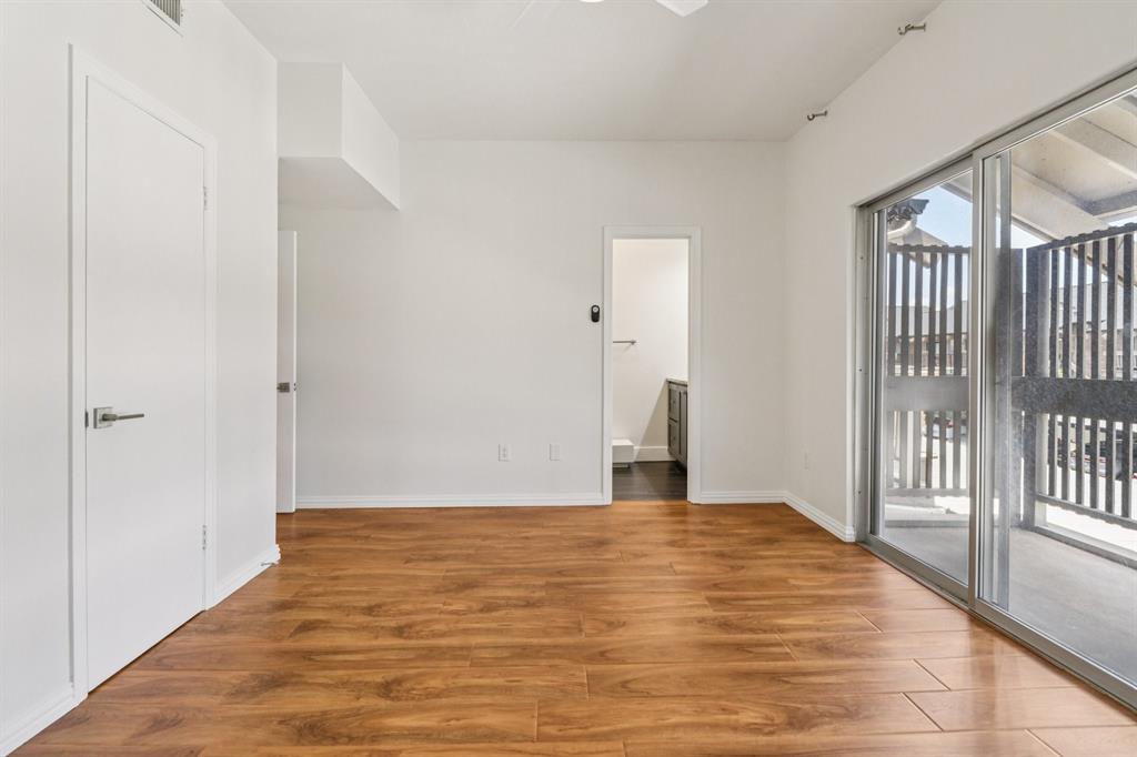 10754 Villager Road, Unit D Dallas, TX 75230 - Photo 29 of 37 a view of empty room
