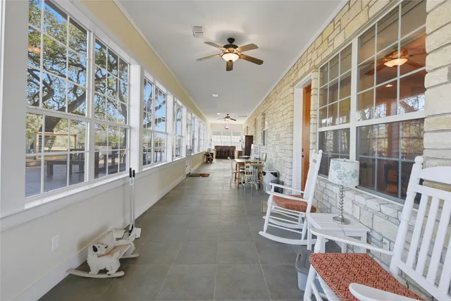 a bathroom with a tub sink and shower