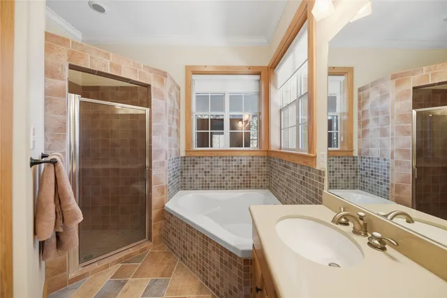 a bed room with a bed and a chandelier