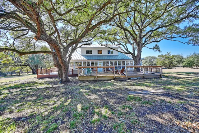 a view of a backyard with green space