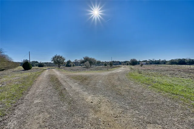 a view of a swimming pool with an outdoor space and seating area