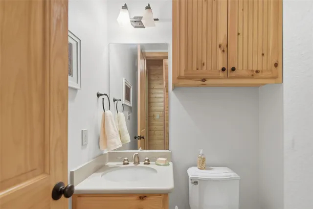 a bedroom with furniture and a fireplace