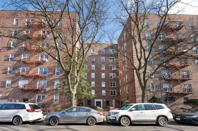 a view of parking space with cars parked