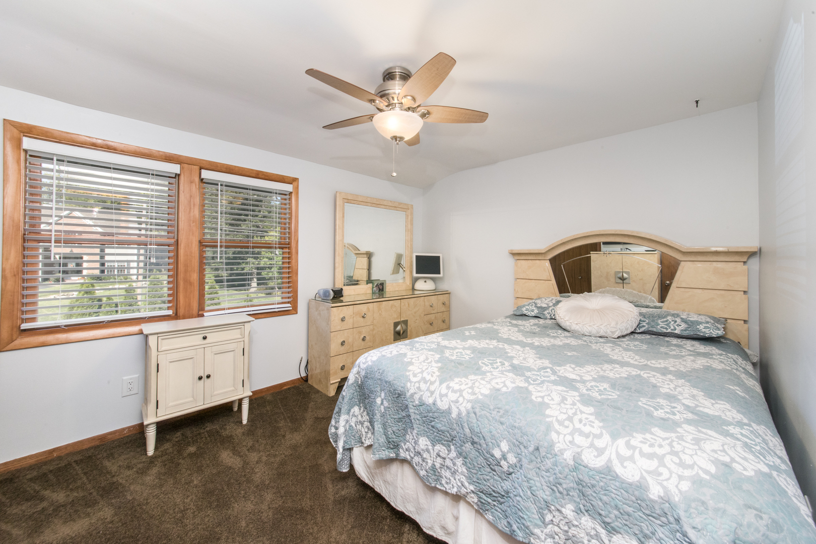 213 Forest View Drive Lake Bluff, IL 60044 - Photo 17 of 37 a bedroom with a large bed and a window