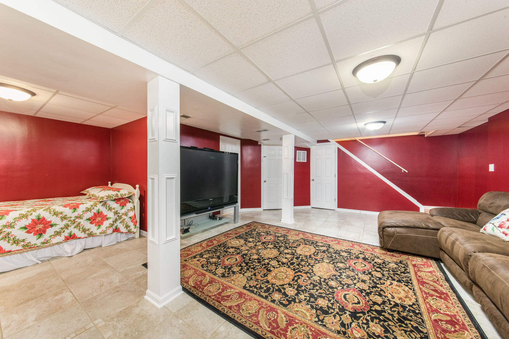 213 Forest View Drive Lake Bluff, IL 60044 - Photo 22 of 37 a living room with a couch and a flat screen tv
