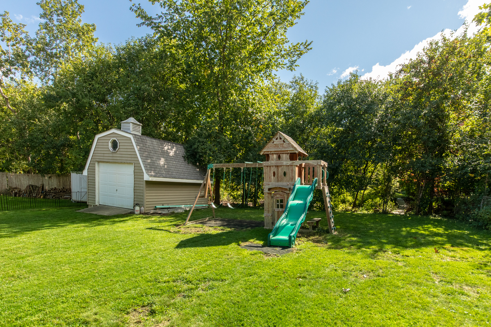 213 Forest View Drive Lake Bluff, IL 60044 - Photo 29 of 37 a front view of a house with a yard and green space