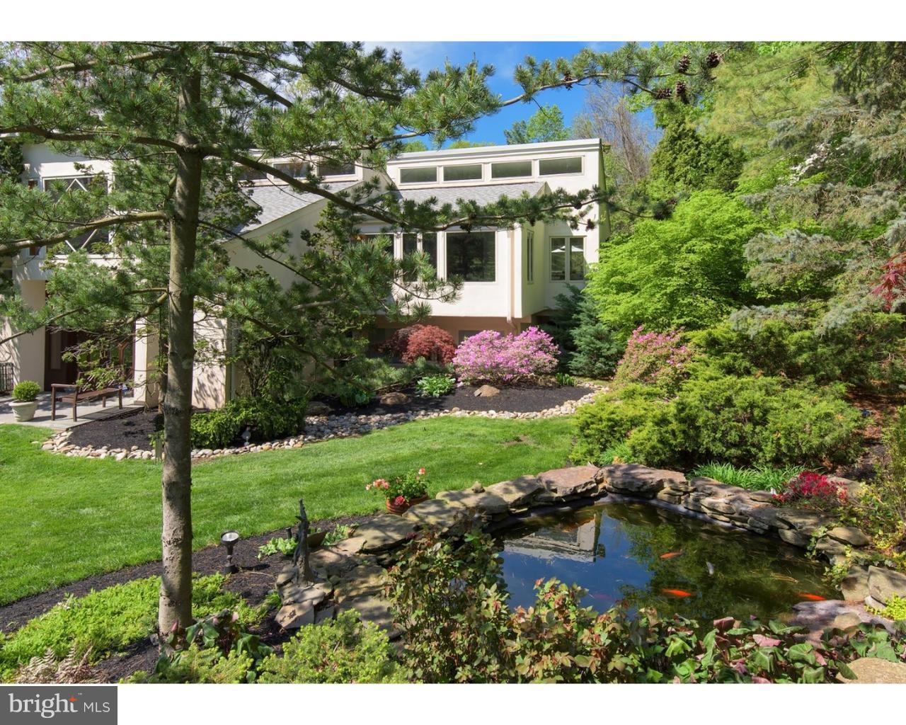 924 Roscommon Road Bryn Mawr, PA 19010 - Photo 2 of 19 Koi pond and exterior front