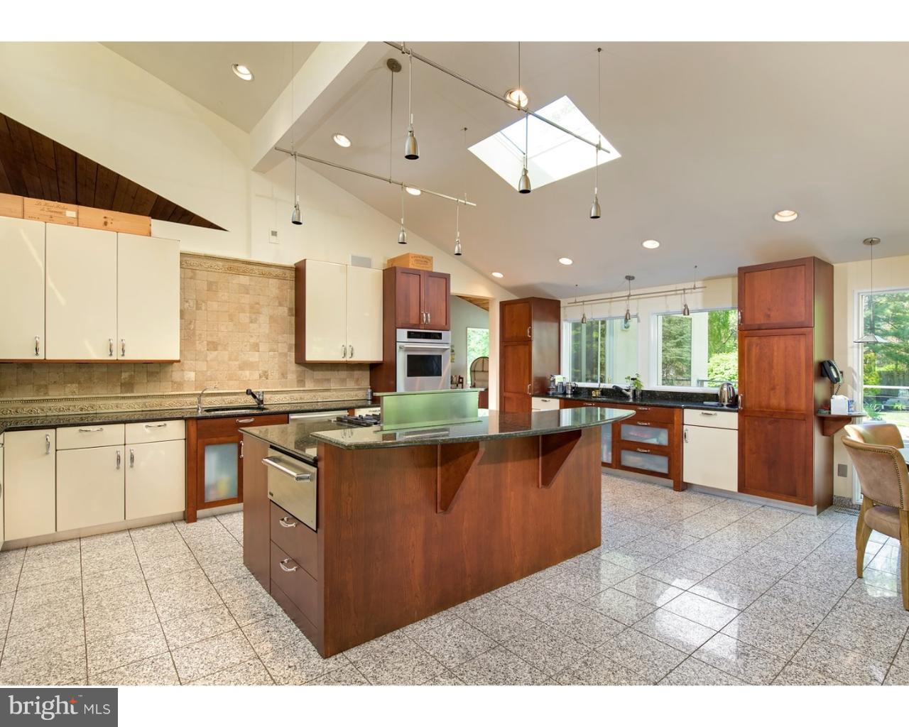 924 Roscommon Road Bryn Mawr, PA 19010 - Photo 13 of 19 Kitchen featuring Large center Island of granite