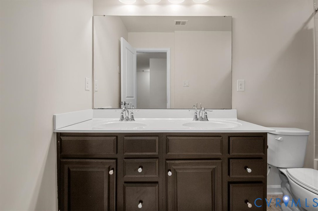 9013 Bailey Hill Road Midlothian, VA 23112 - Photo 40 of 56 Double vanity featuring a white countertop with in