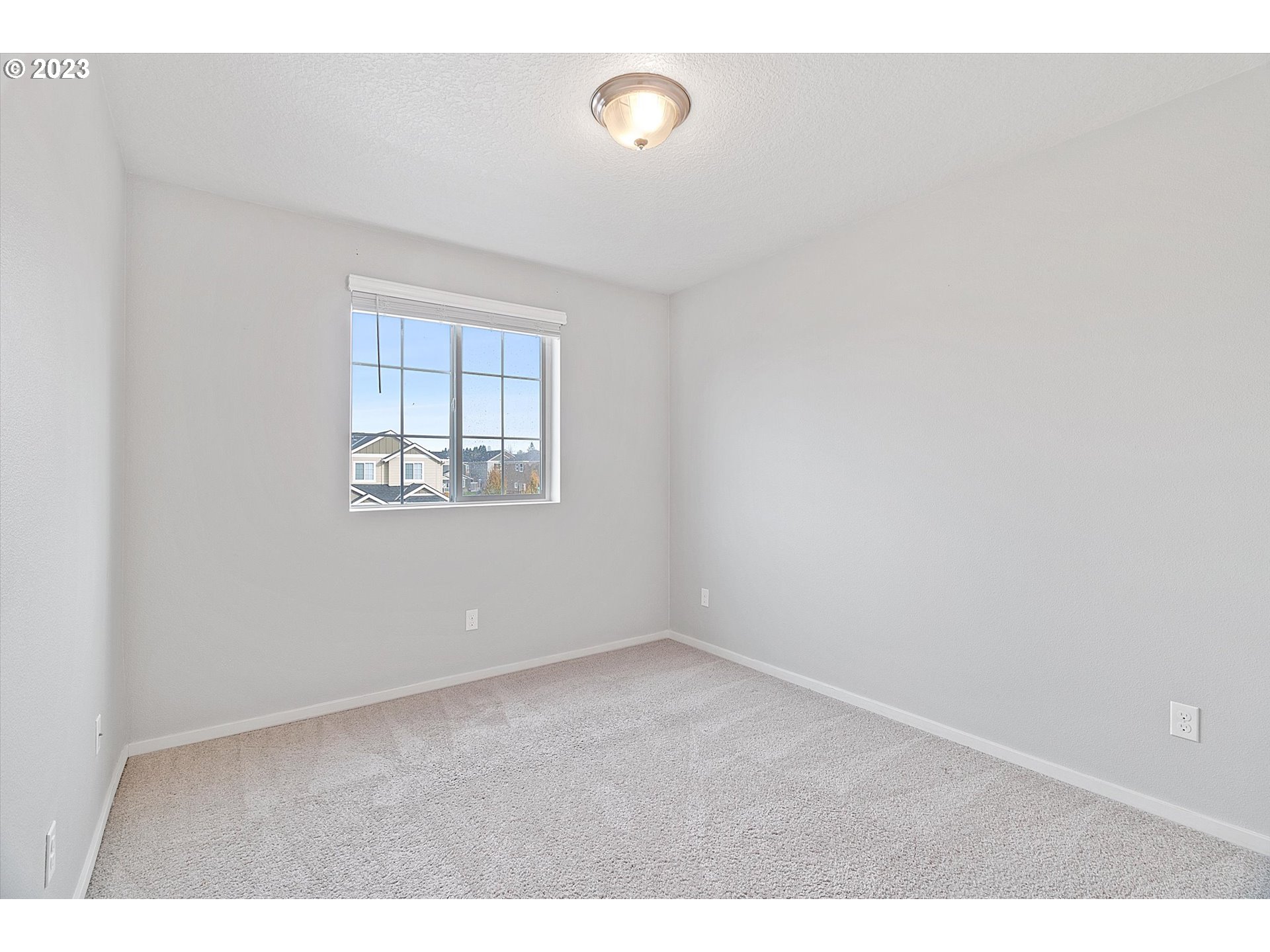 2240 Southeast 16th Street Gresham, OR 97080 - Photo 22 of 36 an empty room with windows