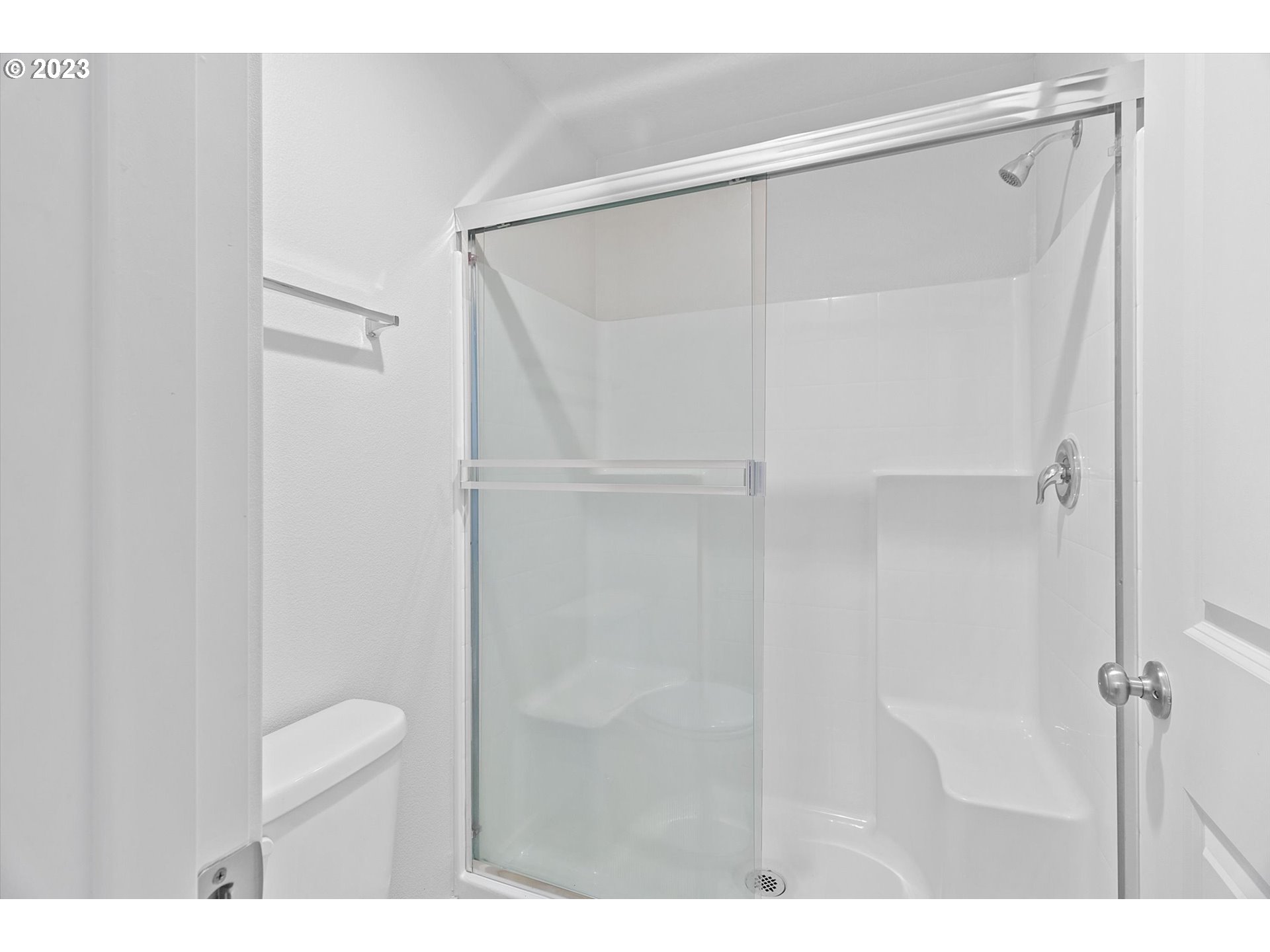 2240 Southeast 16th Street Gresham, OR 97080 - Photo 27 of 36 a bathroom with a shower and a toilet