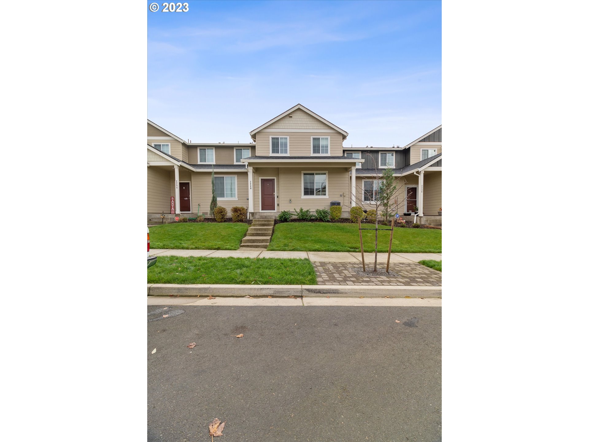 2240 Southeast 16th Street Gresham, OR 97080 - Photo 35 of 36 a view of a big house with a big yard and large trees