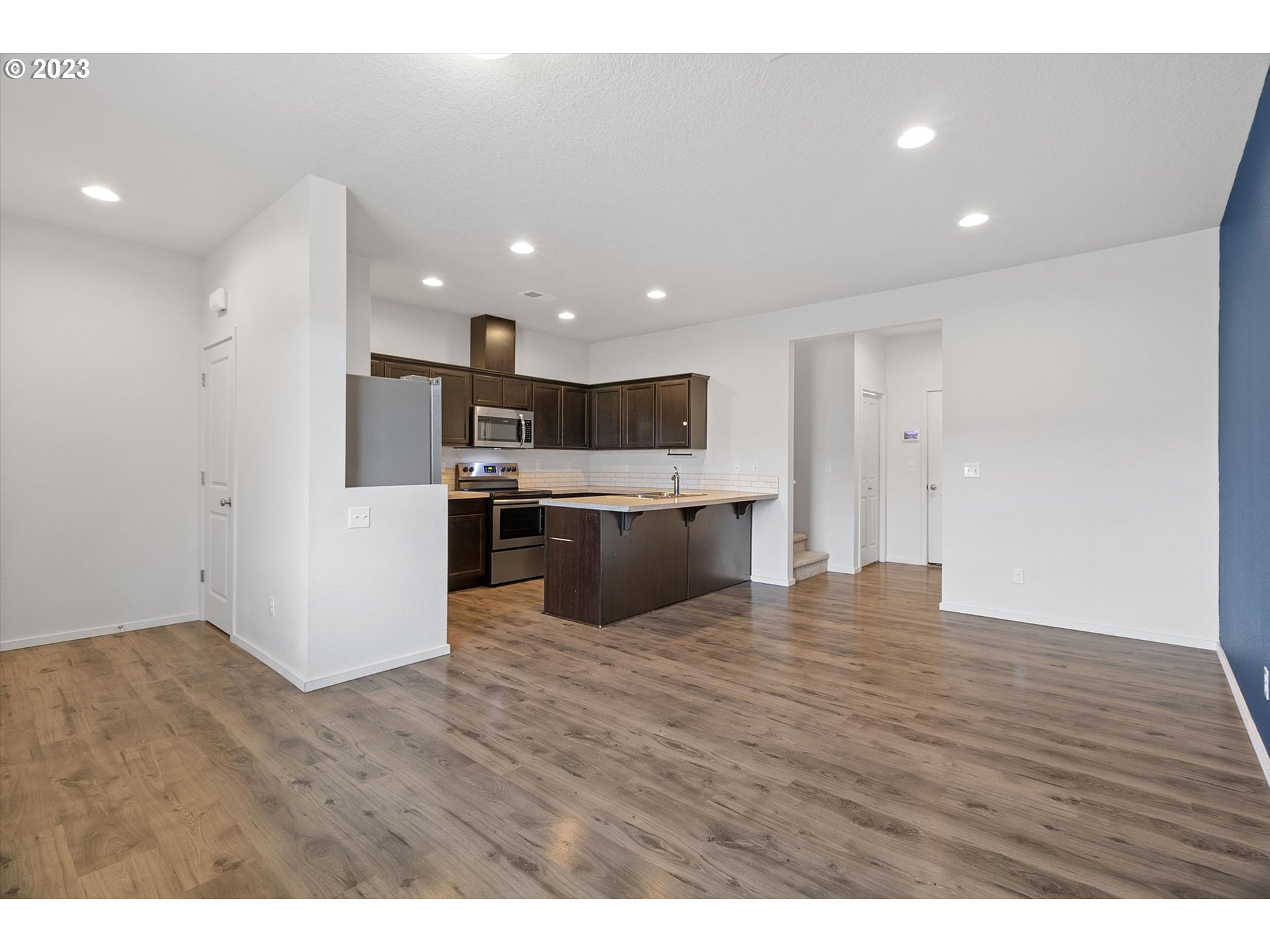 2240 Southeast 16th Street Gresham, OR 97080 - Photo 4 of 36 a view of kitchen with wooden floor