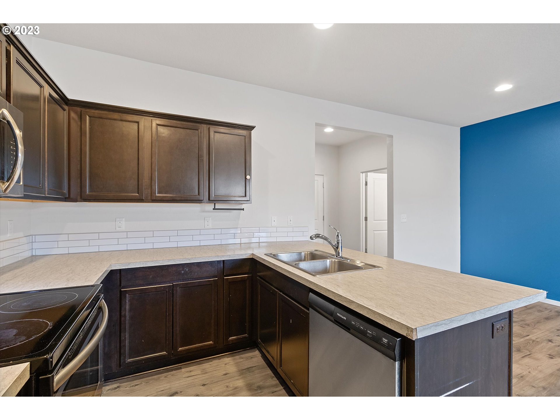 2240 Southeast 16th Street Gresham, OR 97080 - Photo 7 of 36 a kitchen with a sink and cabinets