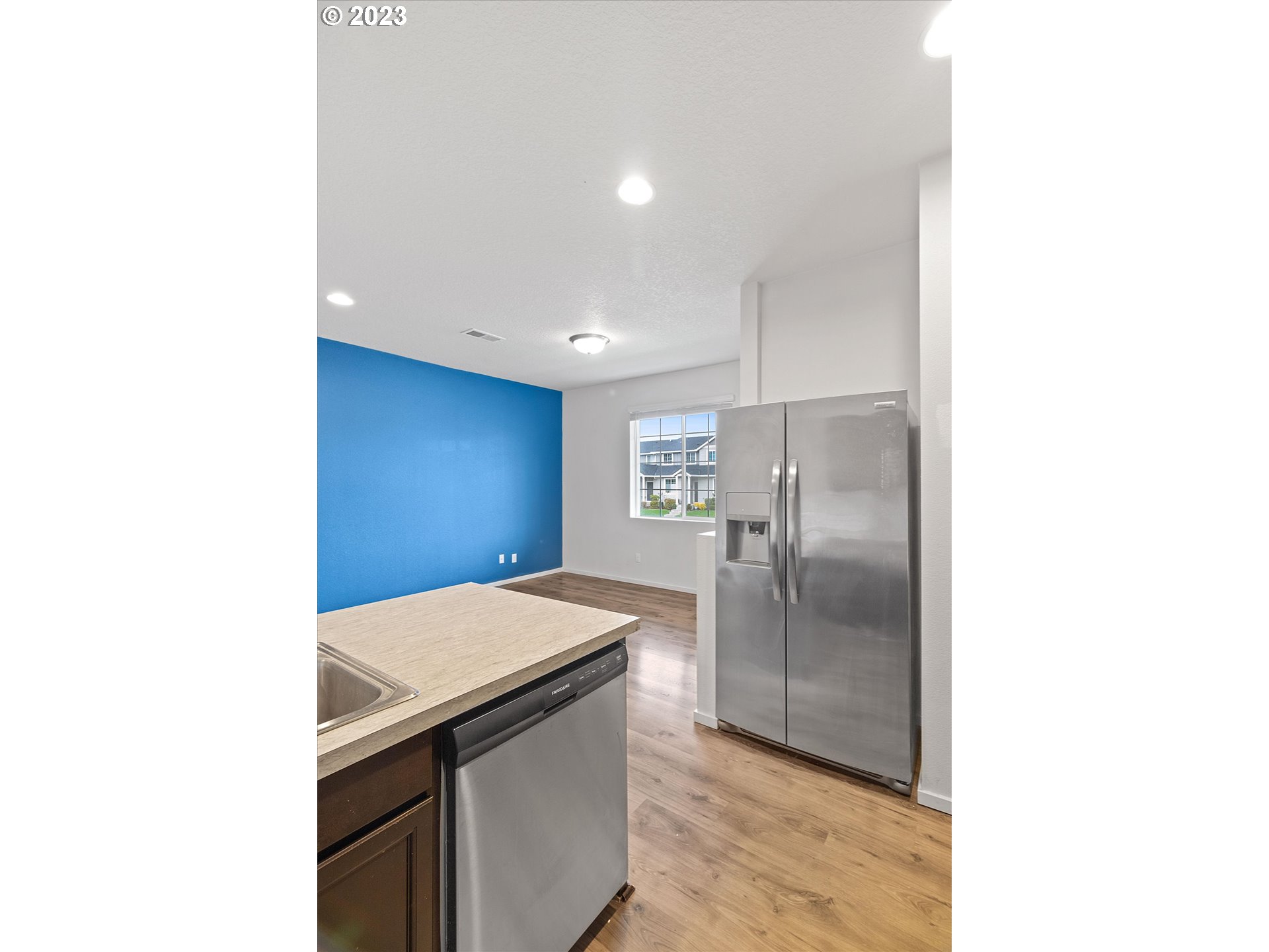 2240 Southeast 16th Street Gresham, OR 97080 - Photo 9 of 36 a kitchen with a refrigerator and a sink