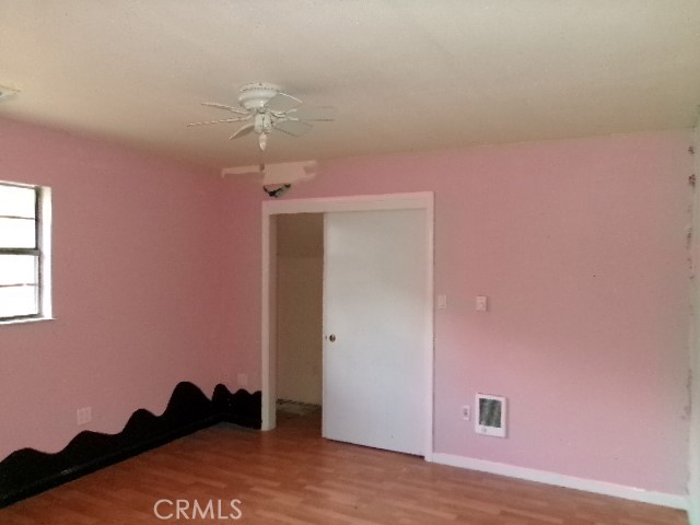 17392 Cache Creek Road Clearlake Oaks, CA 95423 - Photo 19 of 25 a view of a livingroom with an empty space and a ceiling fan