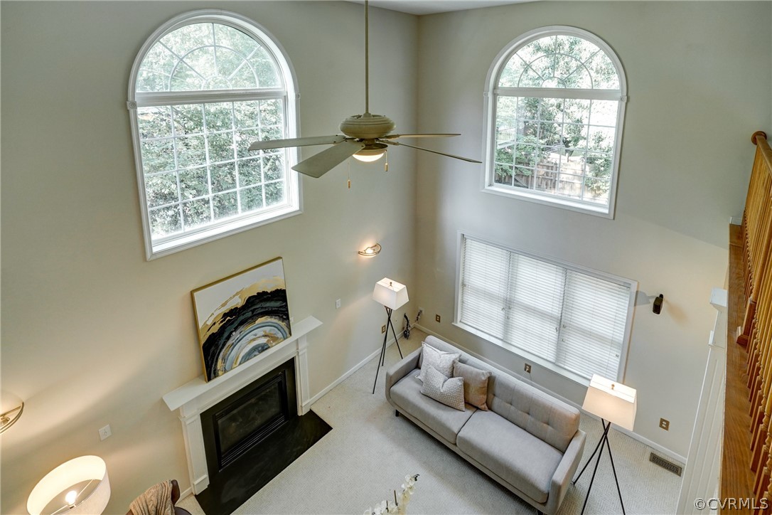 840 Club Ridge Terrace Chester, VA 23836 - Photo 16 of 47 a living room with furniture and a window