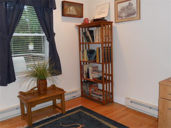 2 Border Road Natick, MA 01760 - Photo 6 of 15 a living room with furniture and a potted plant