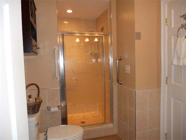 2 Border Road Natick, MA 01760 - Photo 8 of 15 a bathroom with a shower a toilet and sink