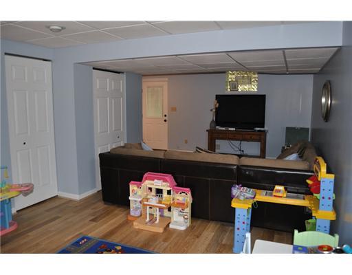 360 Pinkerton Road Wexford, PA 15090 - Photo 15 of 18 Den/Family/Great Room. Finished Basement with Hardwood Flooring & Walk-Out to Rear Yard