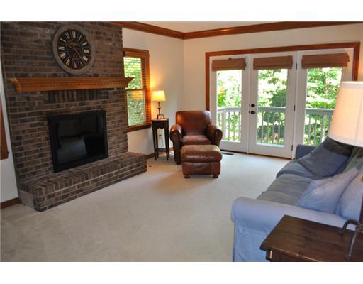 360 Pinkerton Road Wexford, PA 15090 - Photo 7 of 18 Family Room. Family Room with Gas Fireplace, Crown Moldings & Door to Hugh Deck
