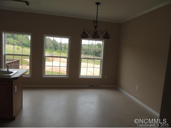 131 Timber Ridge Rutherfordton, NC 28139 - Photo 4 of 11 a view of an empty room with a window