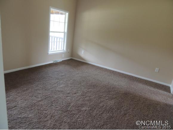 131 Timber Ridge Rutherfordton, NC 28139 - Photo 6 of 11 an empty room with a window