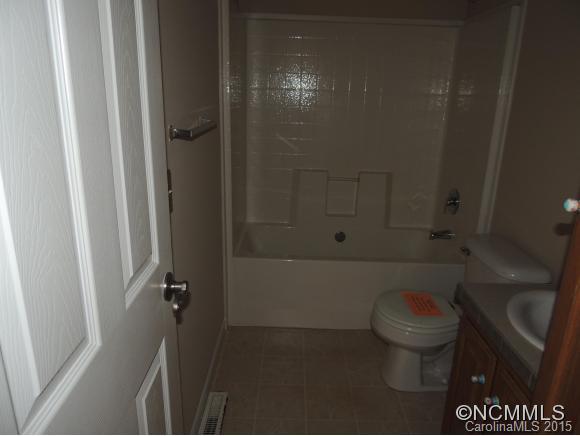 131 Timber Ridge Rutherfordton, NC 28139 - Photo 8 of 11 a bathroom with a toilet and a shower