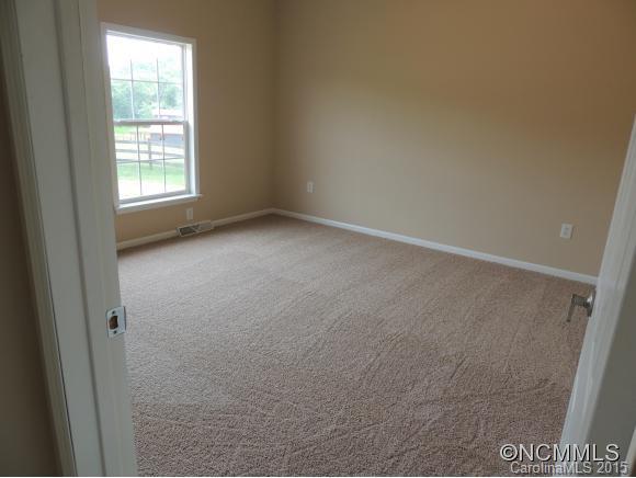 131 Timber Ridge Rutherfordton, NC 28139 - Photo 9 of 11 an empty room with a window
