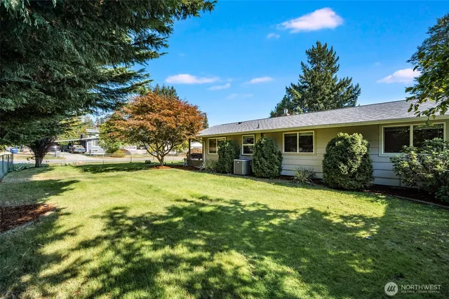 a view of a house with swimming pool