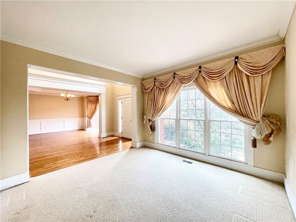 555 Vinings Springs Drive Southeast Mableton, GA 30126 - Photo 11 of 57 an empty room with windows