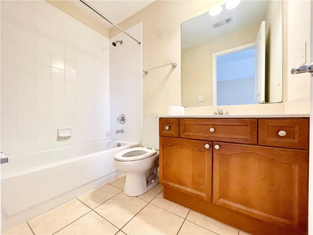 555 Vinings Springs Drive Southeast Mableton, GA 30126 - Photo 41 of 57 a bathroom with a sink a toilet and shower